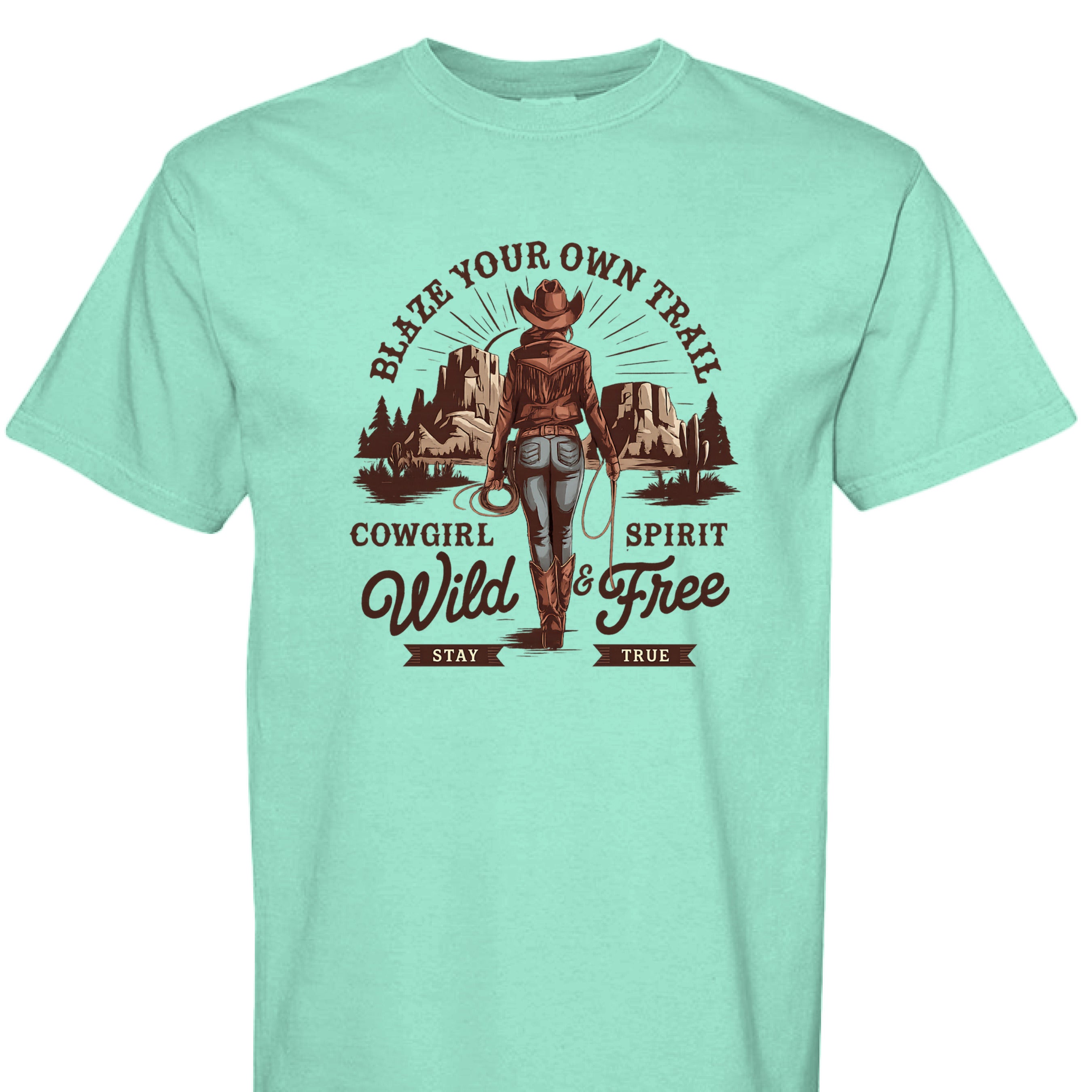 ISLAND REEF - FRONT - Cowgirl graphic shirt with rope border, desert mountains, and text Blaze Your Own Trail Wild & Free.