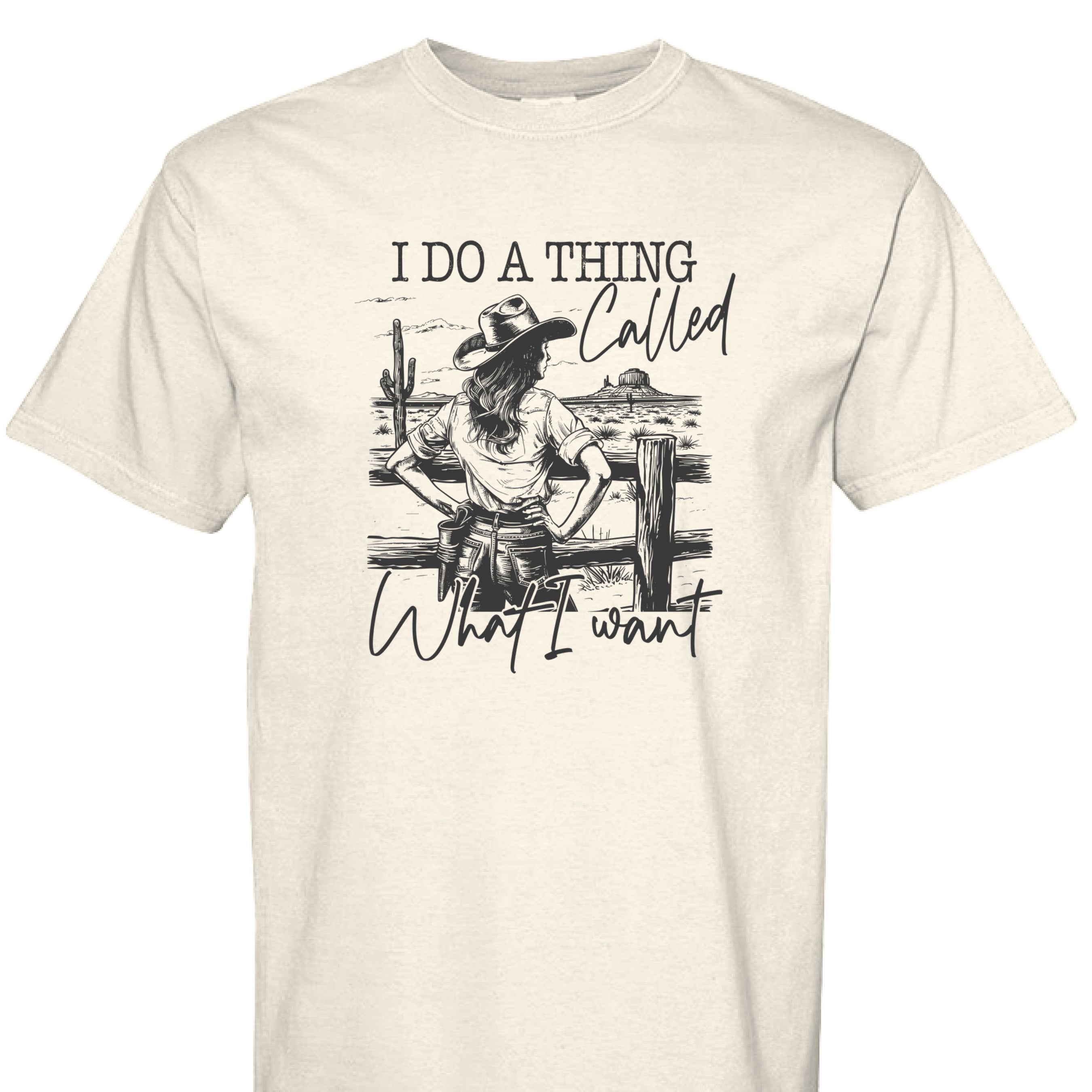 IVORY - FRONT - I Do a Thing Called What I Want western shirt with cowgirl in hat and boots leaning on fence in desert landscape.