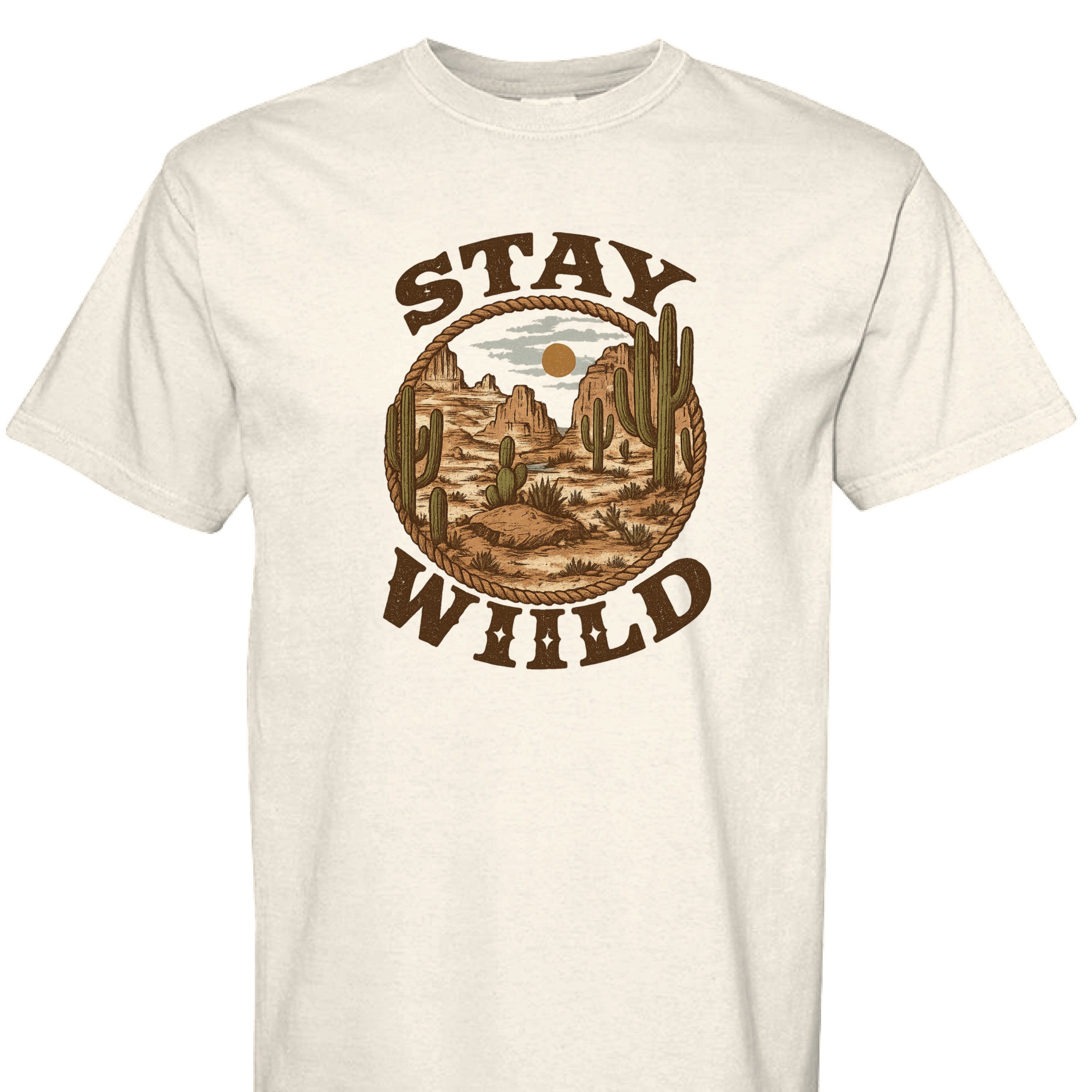 IVORY - FRONT - Stay Wild western graphic tee with desert mountains, cacti, rope border, and bold rustic lettering.