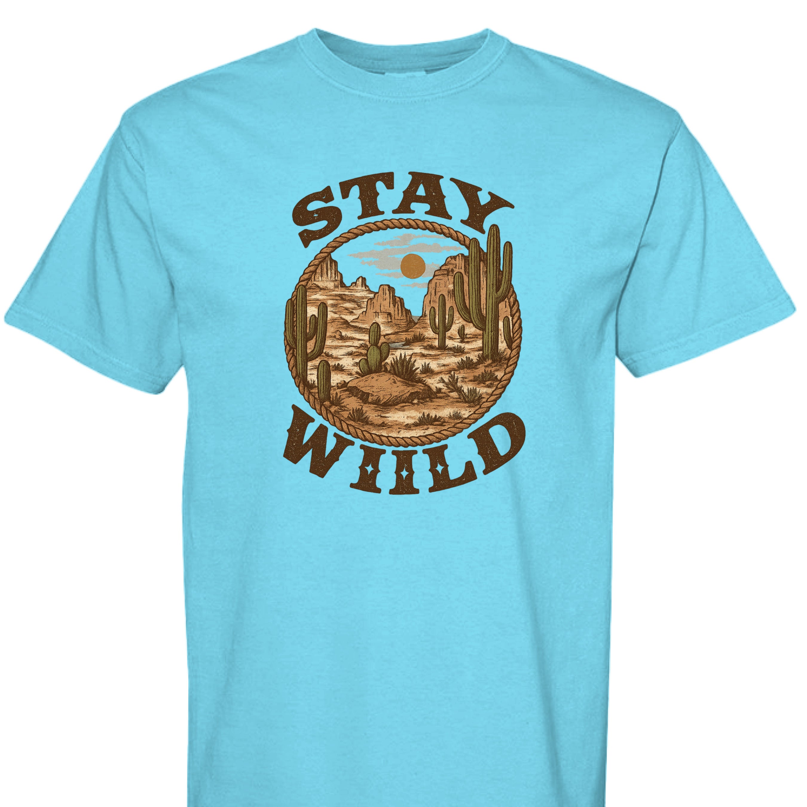 LAGOON BLUE - FRONT - Stay Wild western graphic tee with desert mountains, cacti, rope border, and bold rustic lettering.