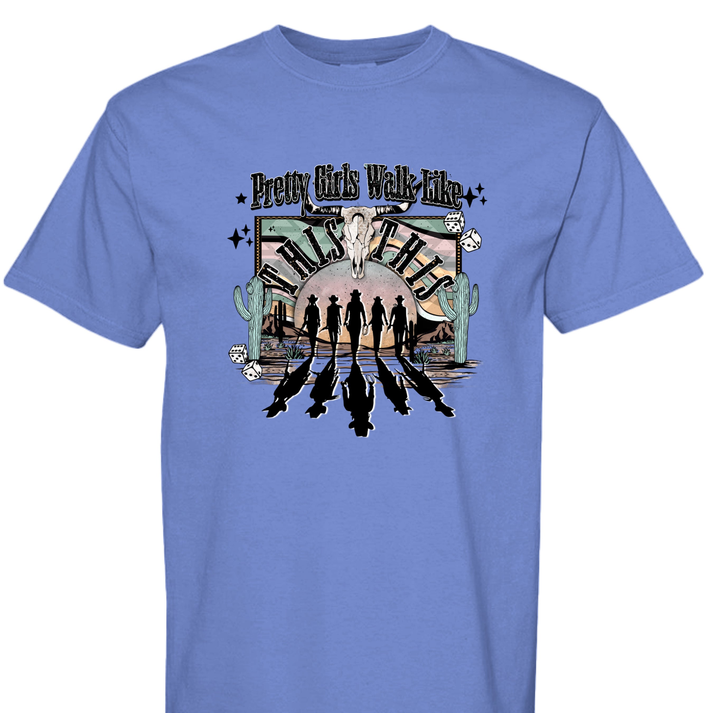 MYSTIC BLUE - FRONT - Western graphic T-shirt design with cowgirl silhouettes, steer skull, desert sunset, dice, and text Pretty Girls Walk Like This.