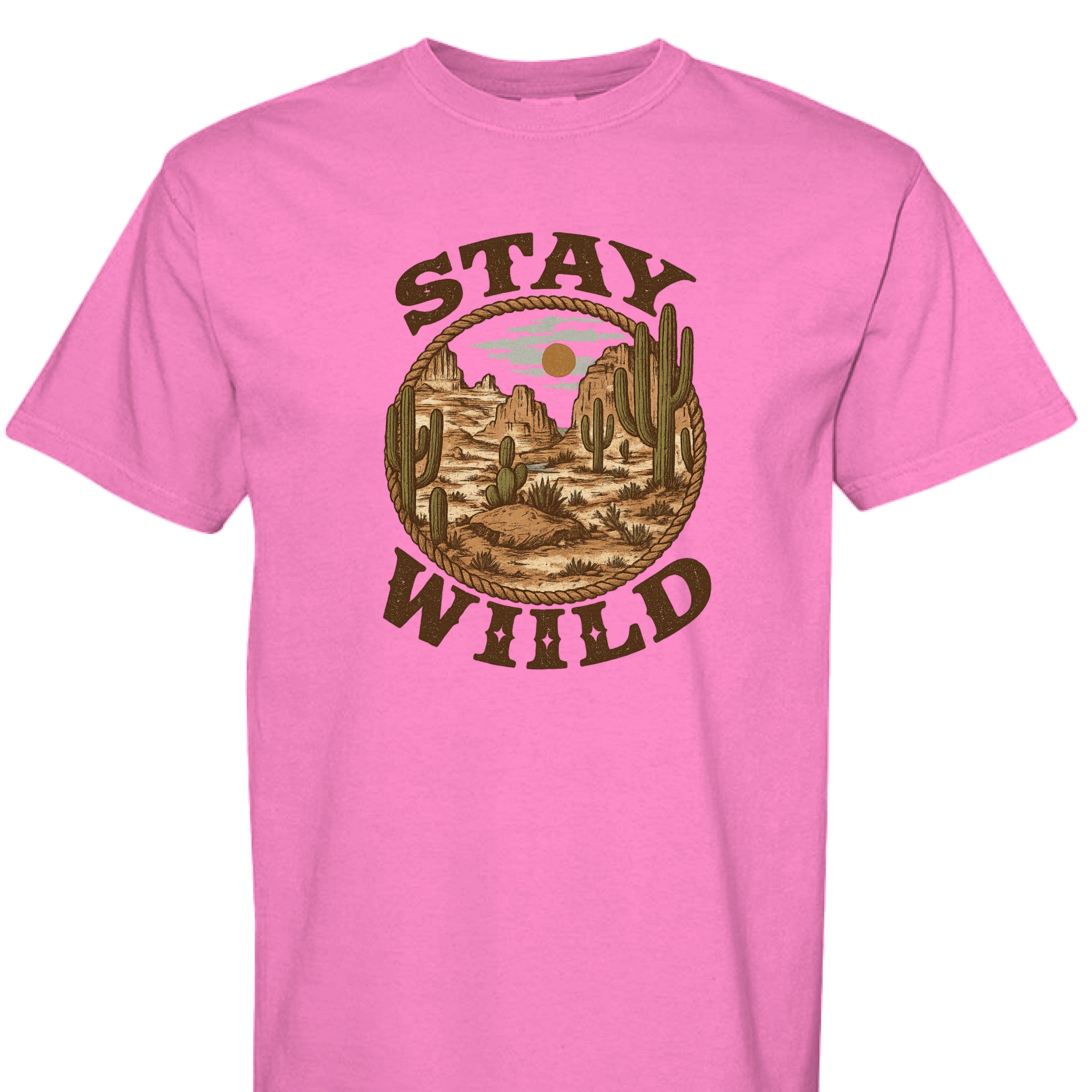 NEON PINK - FRONT = Stay Wild western graphic tee with desert mountains, cacti, rope border, and bold rustic lettering.