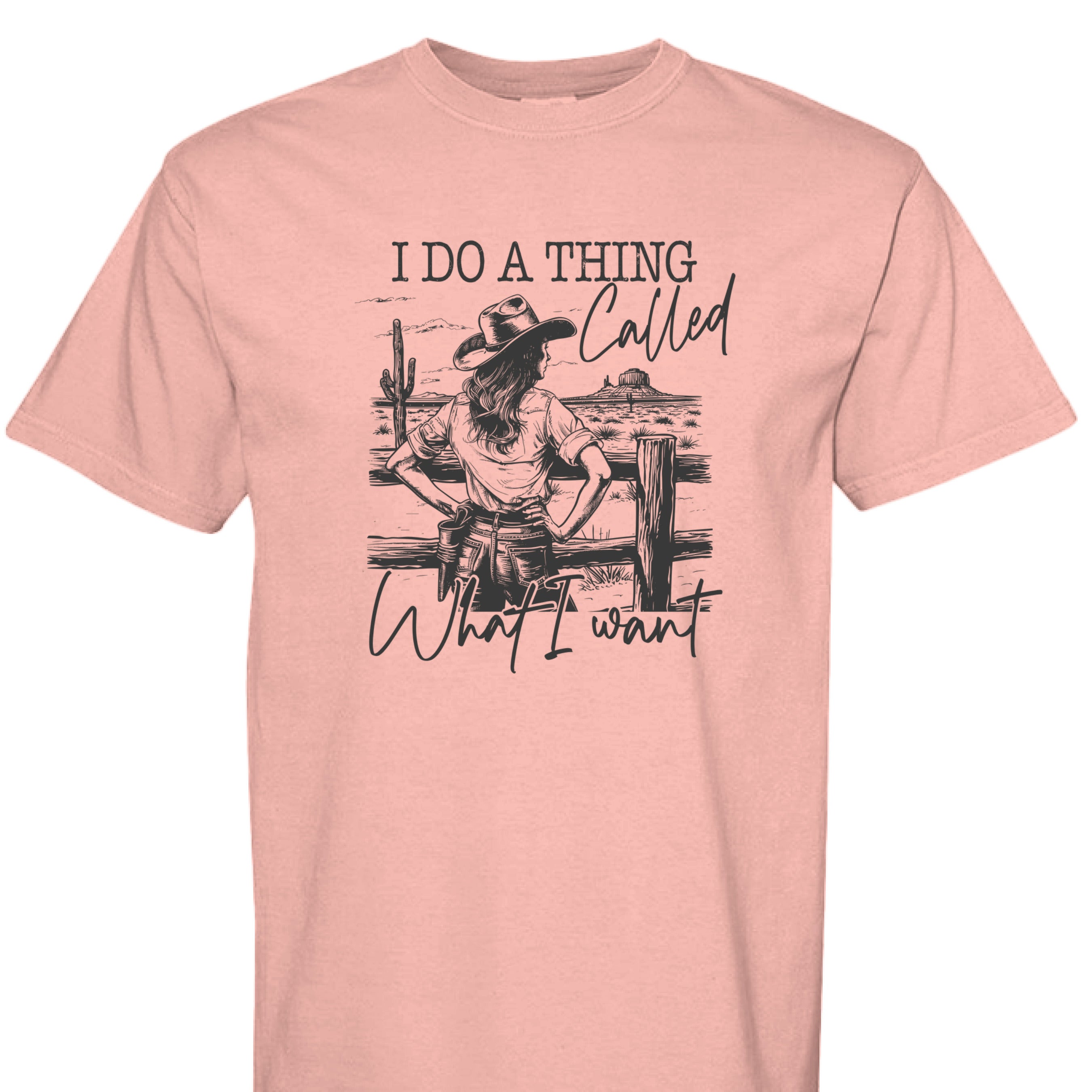 Peachy - FRONT - I Do a Thing Called What I Want western shirt with cowgirl in hat and boots leaning on fence in desert landscape.