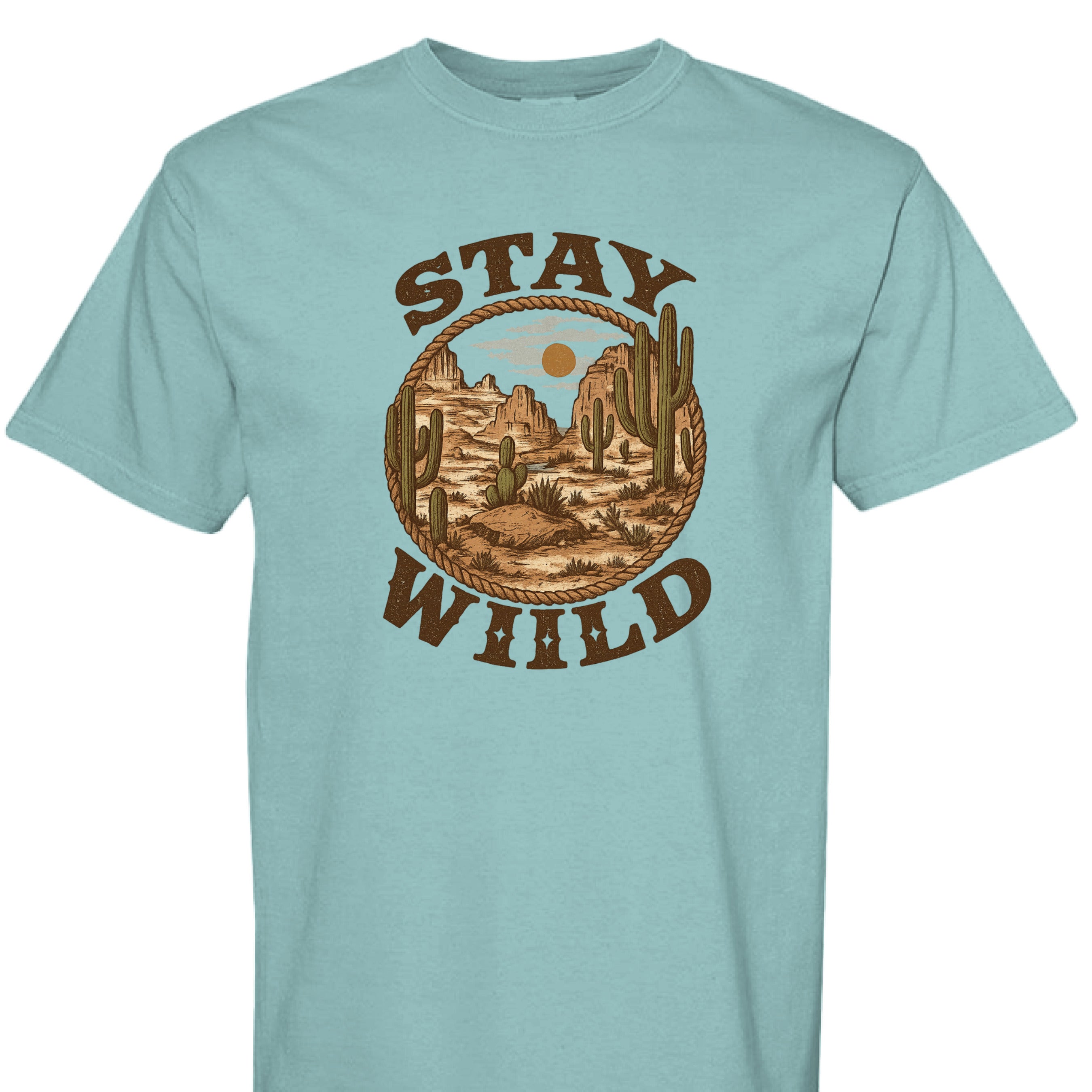 SEAFOAM - FRONT - Stay Wild western graphic tee with desert mountains, cacti, rope border, and bold rustic lettering.