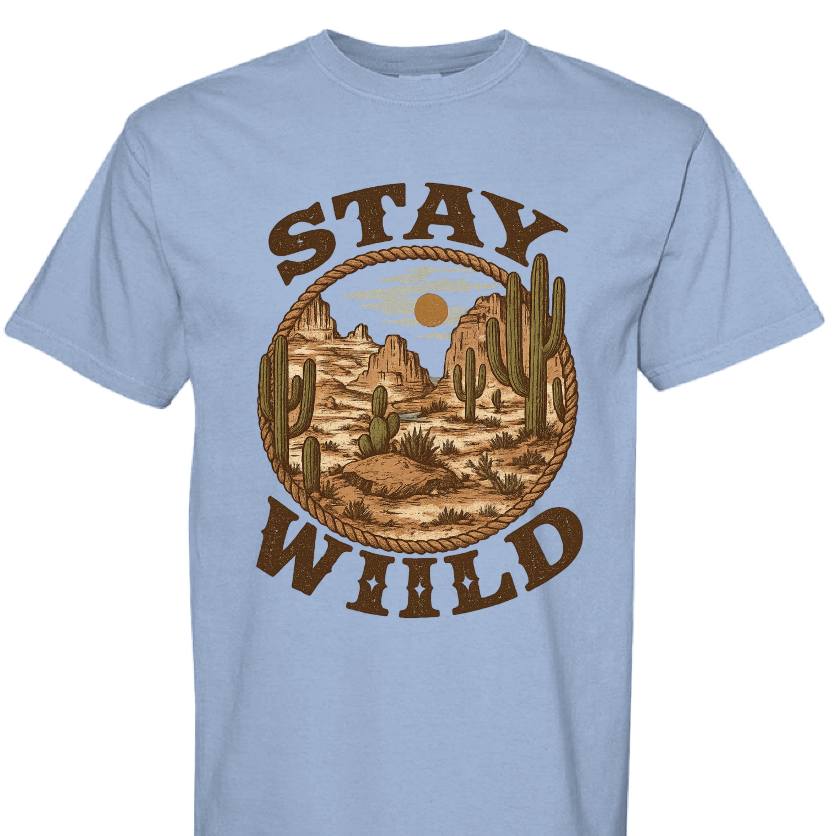WASHED DENIM - FRONT - Stay Wild western graphic tee with desert mountains, cacti, rope border, and bold rustic lettering.