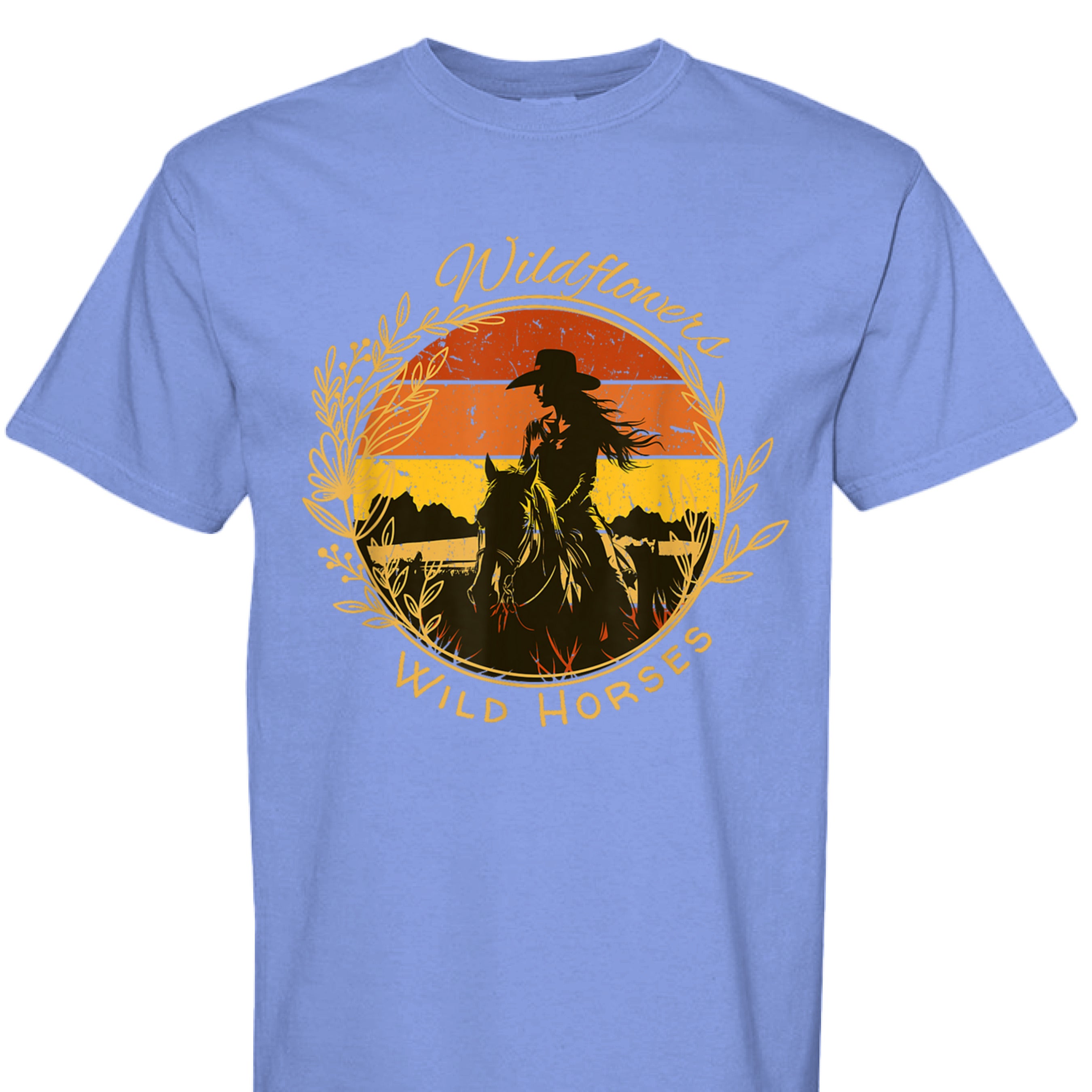 FLO BLUE - FRONT - Wildflowers Wild Horses western shirt with cowgirl riding horse at sunset inside floral wreath graphic design.