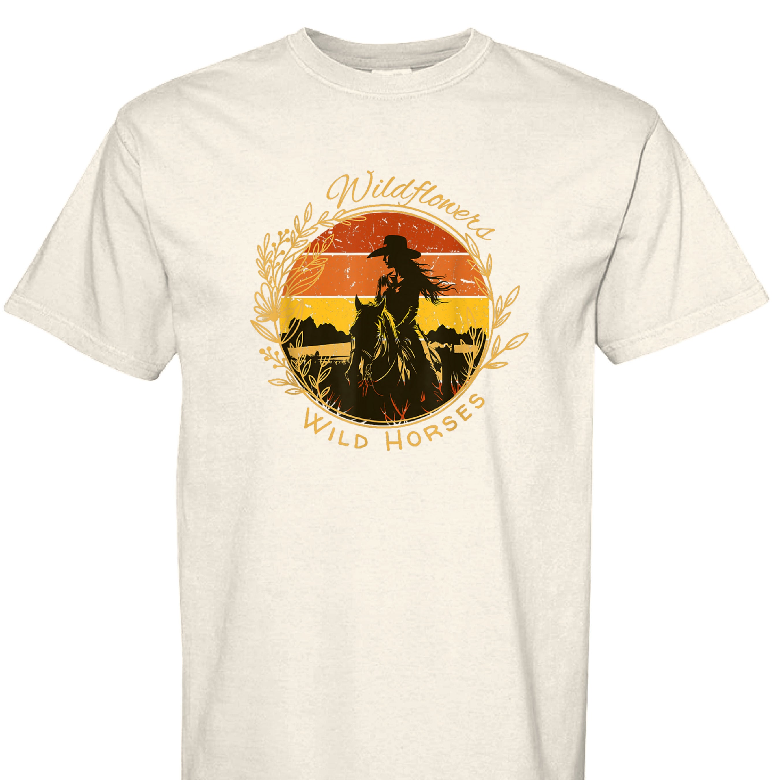 IVORY - FRONT - Wildflowers Wild Horses western shirt with cowgirl riding horse at sunset inside floral wreath graphic design.