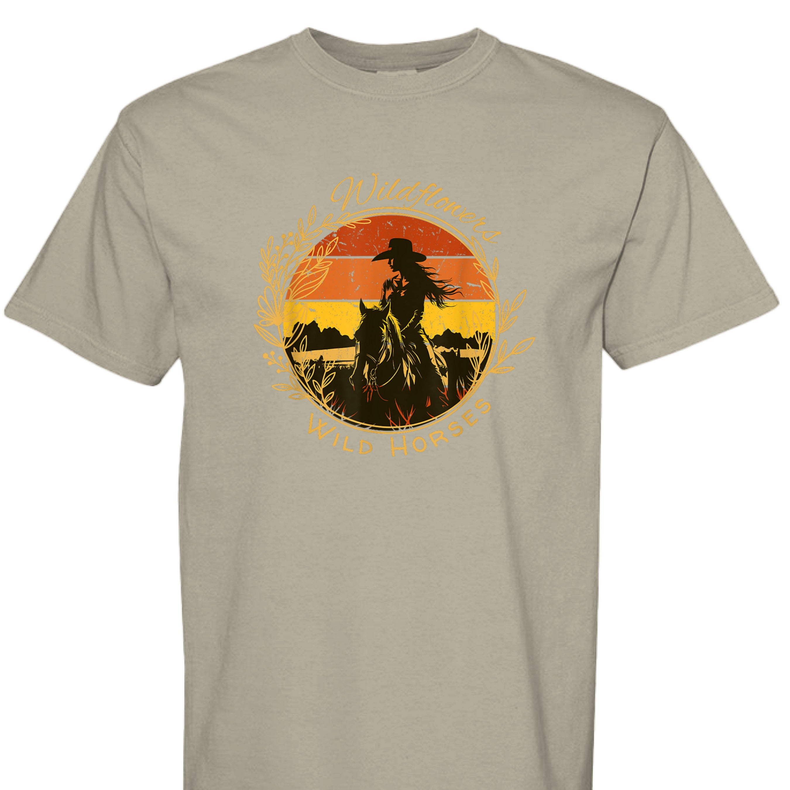 SANDSTONE - FRONT - Wildflowers Wild Horses western shirt with cowgirl riding horse at sunset inside floral wreath graphic design.