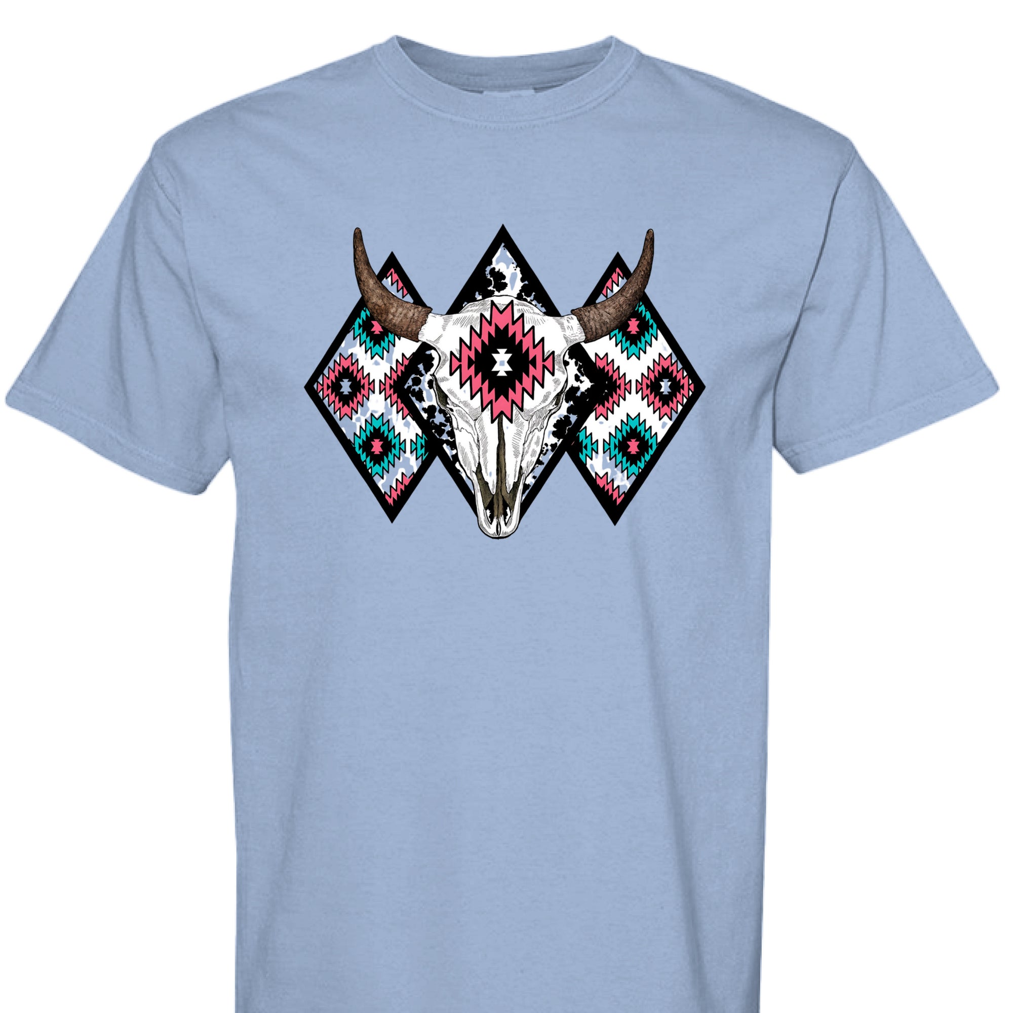 WASHED DENIM - FRONT - Western graphic t-shirt featuring a bull skull with Aztec tribal diamond patterns in turquoise, pink, and black.