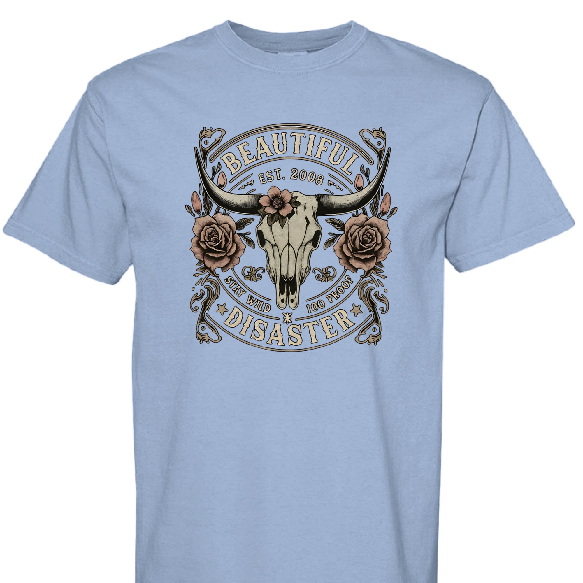 WASHED DENIM - FRONT - Western graphic t-shirt featuring a longhorn skull with roses and text ‘Beautiful Disaster – Stay Wild 100 Proof.’ Vintage distressed design.
